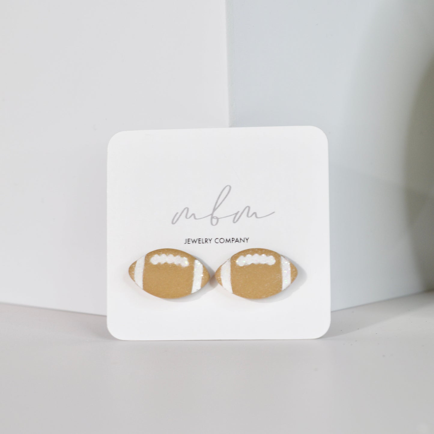 Tan/White Football Studs