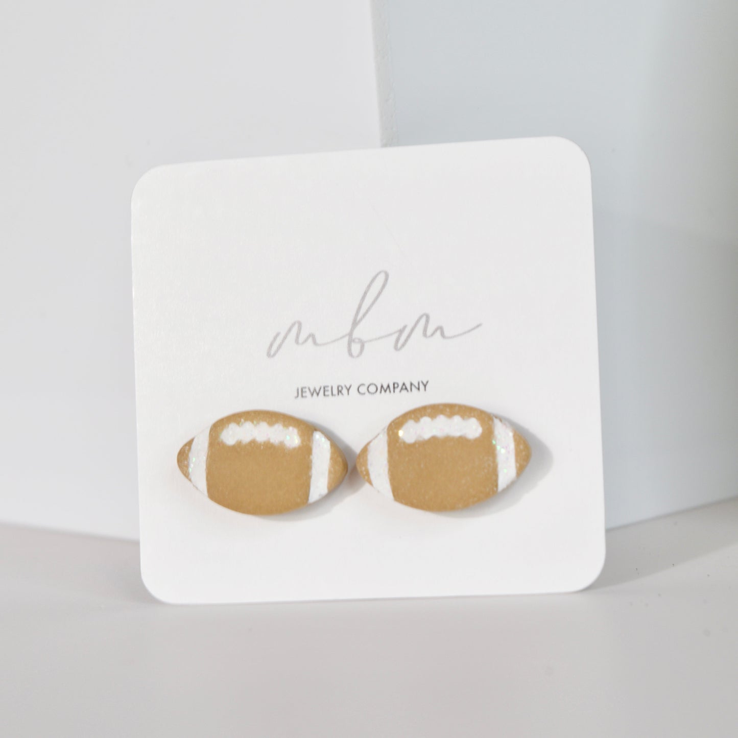 Tan/White Football Studs