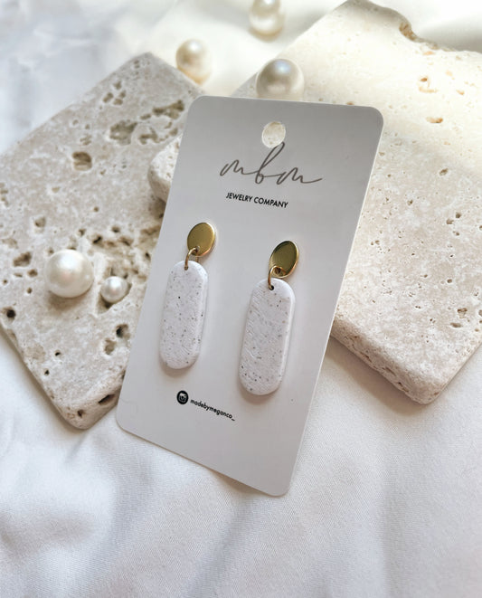 Speckled White Pill Shaped Clay Dangles