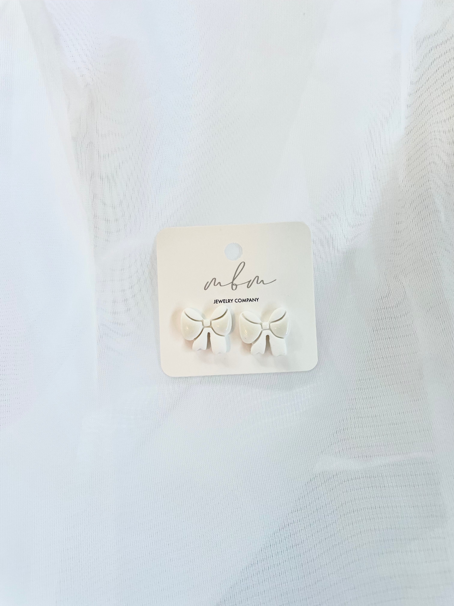 Sheri White Bows